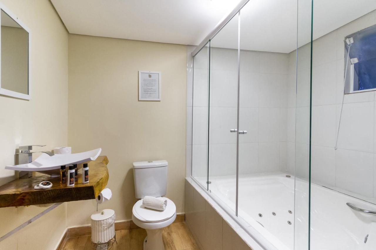 Quarto Triplo com Banheira